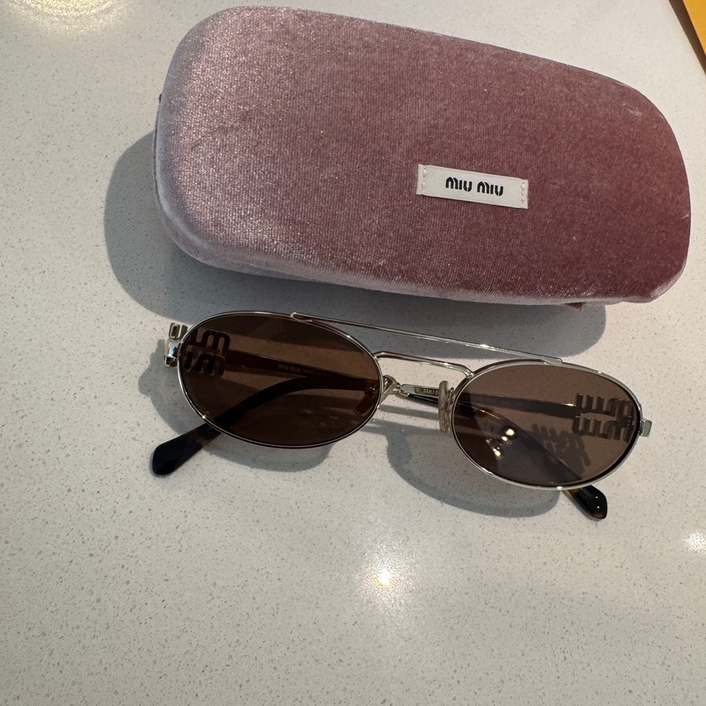 Miu Miu Silver Sunglasses with Black Accents